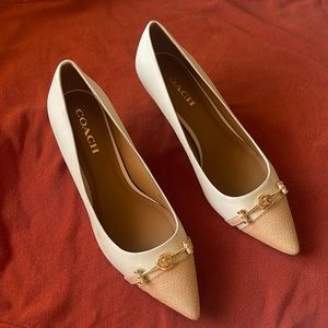 Coach 2 1/2 in heel. Off white leather gold emblem by toe. Size 11 B